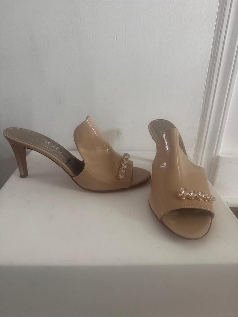 AGL Nude Patent Open-Toe Mule Heels with Crystal Front Detail